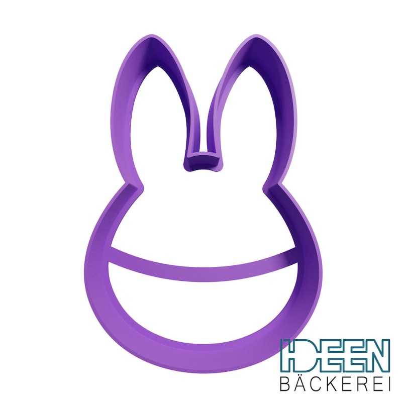 May include: Purple plastic cookie cutter shaped like a bunny rabbit with large ears.