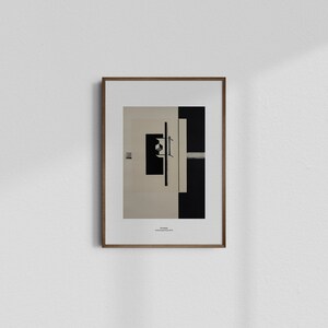 May include: A framed black and white abstract art print with the title "Stillleben" and the artist's name "Johannes Itten, 1924".
