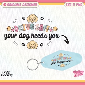 May include: A blue and pink key chain with a dog and the text "Drive Safe your dog needs you".