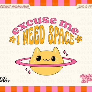 May include: A yellow cat with a pink ring around it, like Saturn, with the text "excuse me *I NEED SPACE*" in pink and yellow letters with flowers on either side.
