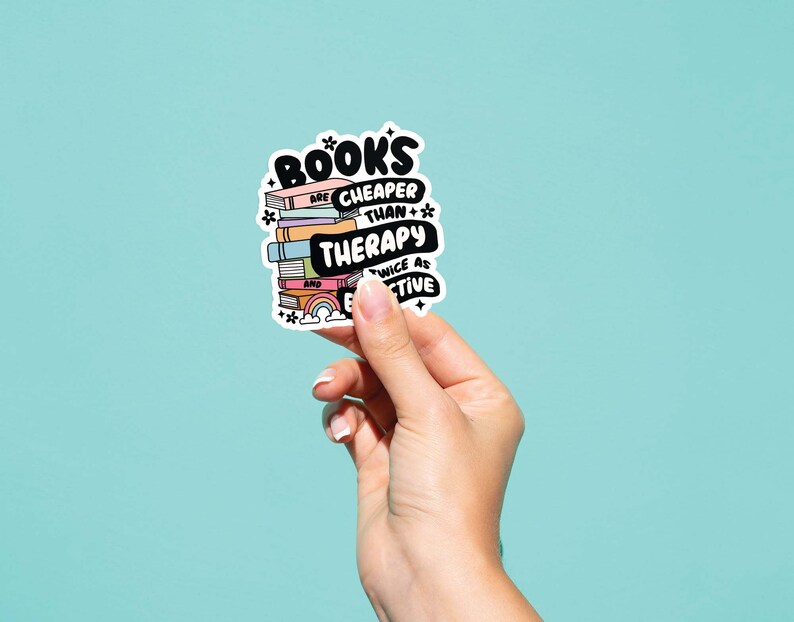 May include: A sticker with a stack of colorful books and the text "BOOKS ARE CHEAPER THAN THERAPY AND TWICE AS EFFECTIVE".