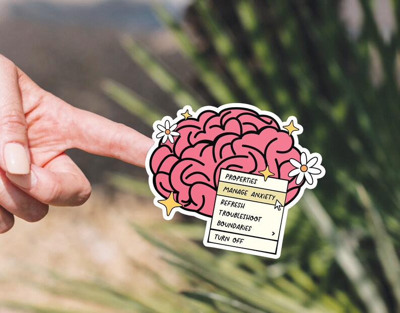 May include: A pink brain with a white outline and yellow stars. The brain has a white menu with the text "Properties: Manage Anxiety" and options to "Refresh", "Troubleshoot", "Boundaries", and "Turn Off".