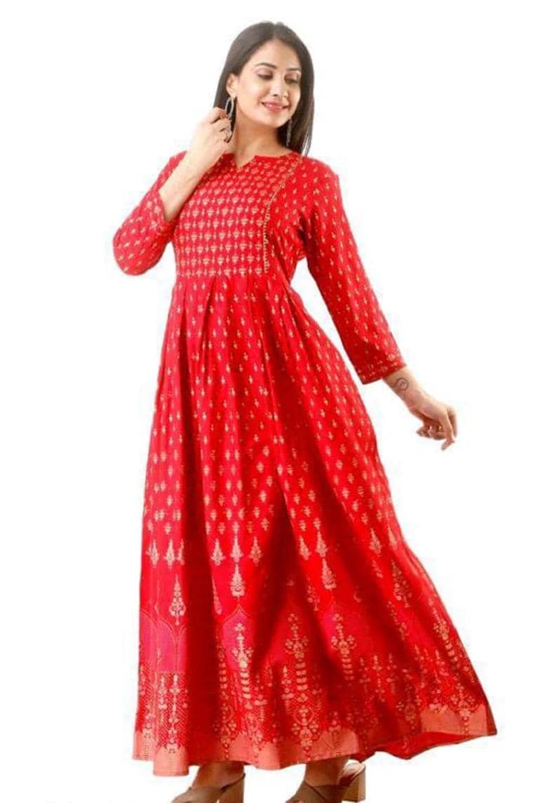 May include: A red maxi dress with a gold print. The dress has a V-neckline and 3/4 sleeves. The dress is made of a soft, comfortable fabric and is perfect for any occasion.