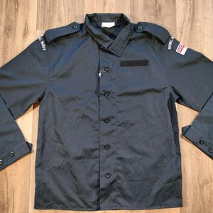 Royal navy blue shirt.