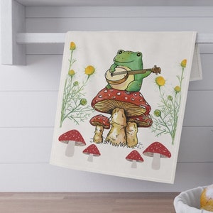 Frog on Cute Red Mushrooms Cottagecore Tea Towel,  Banjo Frog Dish Towel for Cottagecore Kitchen Decor