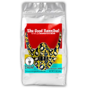 May include: A silver bag of decaf coffee beans with a yellow and blue design. The bag is labeled "The Good Hannibal" and "Decaf". The bag is 12 ounces (340 grams).