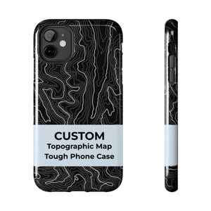 May include: Black phone case with a topographic map design in white. The case has a white band with the words "CUSTOM Topographic Map Tough Phone Case". The phone case is shown from the front and side.
