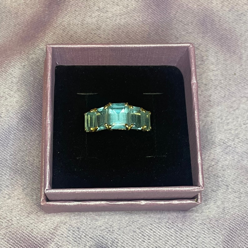 Blue Topaz Ring 10k gold size 5.75 image 1