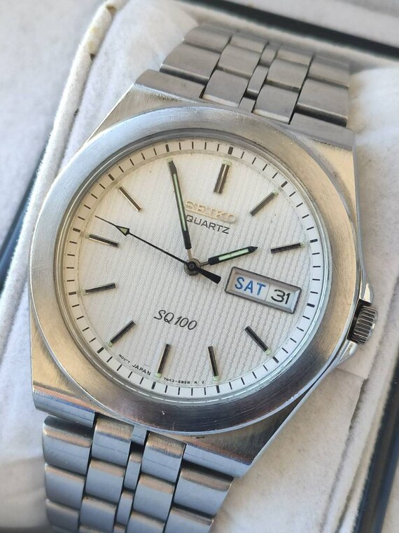 Montre Seiko SQ Quartz - Années 80, Boîtier Doré, Bracelet Cuir Noir