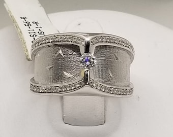 14 Karat White Gold Floating Diamond Ring .76 Carats