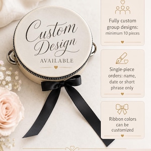 May include: A round, cream-colored tambourine featuring the black text "Custom Design AVAILABLE" and a black satin ribbon bow. To the right, three informational boxes detail customization options for group designs, single-piece orders, and ribbon colors.
