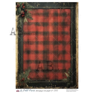May include: Decoupage rice paper with a red and black plaid pattern, framed in black with a distressed look. The corners feature sprigs of pine and red berries, with the text "A studio" and "Le Petit Paris" visible.