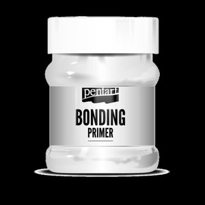 May include: A white jar of Pentart Bonding Primer with a white lid. The product label features the brand name and the product name in bold, black letters. The jar is filled with a white substance.