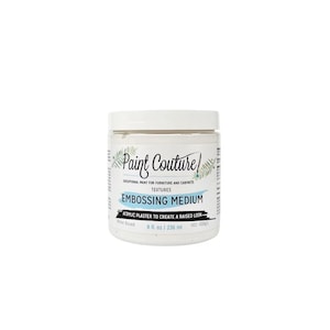 May include: A white jar of Paint Couture Embossing Medium. The label includes the text "Exceptional Paint for Furniture and Cabinets" and "Acrylic Plaster to Create a Raised Look." The jar contains 8 fl oz, or 236 ml, of product.