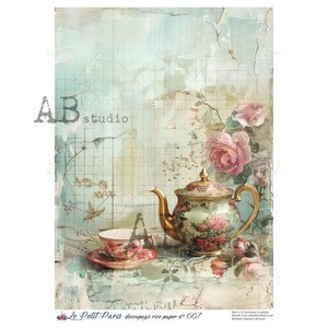 May include: Decorative rice paper with a vintage tea party theme. The image features a teapot, teacup, and saucer with floral designs, set against a backdrop of roses and a faded map. The text "AB studio" and "Le Petit Paris" are visible.