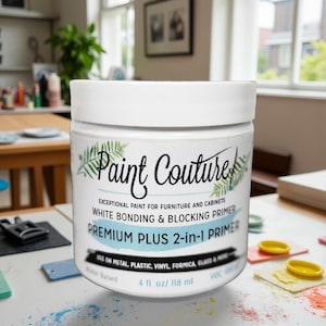 May include: A white paint can with the words "Paint Couture" in black script. The label reads "Premium Plus 2-in-1 Primer" and "4 fl. oz / 118 ml". The paint is designed for furniture and cabinets.