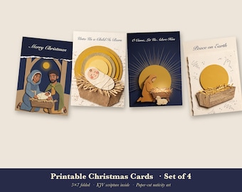 May include: A set of four folded Christmas cards featuring nativity scenes. The cards display paper-cut style illustrations of the holy family, a manger, and a star, with text including Merry Christmas, Unto Us a Child Is Born, O Come, Let Us Adore Him, and Peace on Earth.