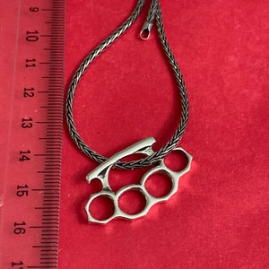 Brass Knuckles Necklace - Etsy