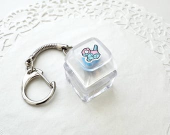 Chaveiro com teclas transparentes e clicky Derpy Pory | Brinquedo antiestresse | Brinquedo sensorial | Alívio do estresse