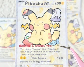 May include: A yellow Pikachu Pokemon card with a cartoon illustration of Pikachu. The card has the text "BASIC Pikachu ex HP 200" at the top. The card has the text "Ability I CHOOSE YOU" and "You chose Pikachu! Find Pikachu in your deck and put it in your hand. Then shuffle your deck." The card has the text "Pika Spark" and "Discard all Energy attached 120". The card has the text "25/151 MIDERZ" at the bottom.
