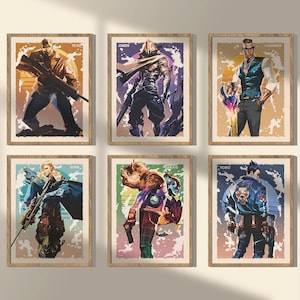 May include: Six framed art prints featuring stylized illustrations of characters. Each print has a unique character design with a distinct color palette. The frames are made of light-colored wood, and the artwork is displayed on a neutral-toned background.