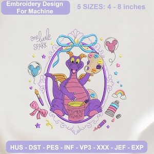 May include: Machine embroidery design featuring a purple dragon holding a paint palette and brush, sitting in a purple oval frame with a blue bow. Text reads one little SPARK and FIGMENT PIGMENT. Includes balloons, a rainbow, and art supplies.
