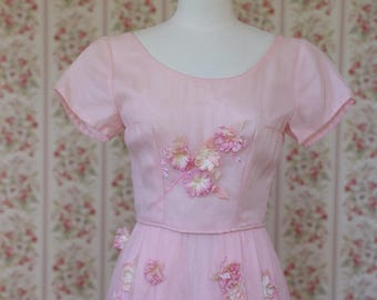 1950s pink organza dress with dead-stock blossoms