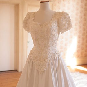 Vintage satin and pearl gown with royal train