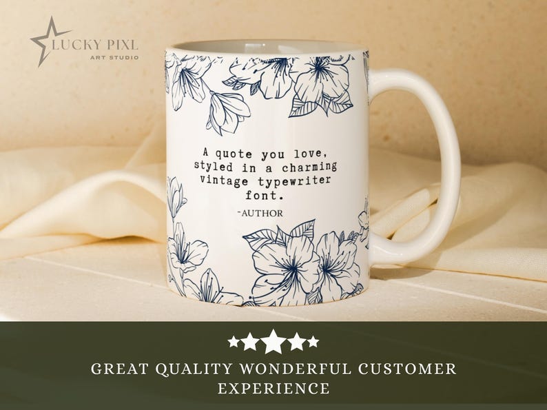 May include: A white ceramic mug featuring a dark blue line art floral pattern and the text: A quote you love, styled in a charming vintage typewriter font. -AUTHOR. The mug has a curved handle and a smooth finish, displaying clear black lettering.