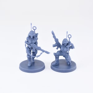 Pinup Corp Guardbabes with radios (2 models) by Across The Realms. 32mm scale made to order 3D print.