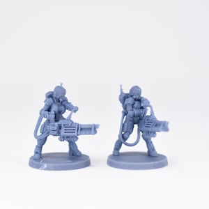 Pinup Corp Stormbabes with Laser Gatlings (2 models) by Across The Realms. 32mm scale made to order 3D print.