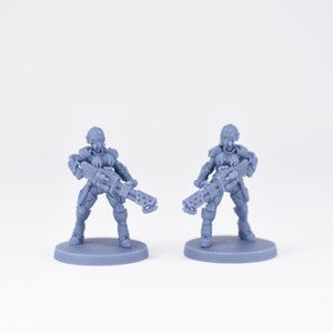 Pinup Corp Stormbabes with flamethrowers (2 models) by Across The Realms. 32mm scale made to order 3D print.