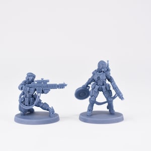 Pinup Corp Stormbabes Sniper and Demolitionist (2 models) by Across The Realms. 32mm scale made to order 3D print.