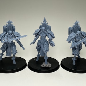 Space Nuns Battle Nuns Warsuits (3 models) by Minigames Miniatures. 32mm scale made to order 3D print.