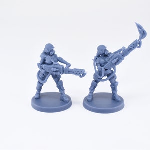 Pinup Corp Guardbabes with flamethrowers (2 models) by Across The Realms. 32mm scale made to order 3D print.