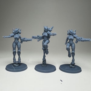 Greater Good Female Stealth Suits (3 models) by Minigames Miniatures. 32mm scale made to order 3D print.