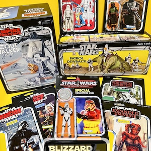 May include: A collection of vintage Star Wars action figure boxes and carded figures. The figures include characters like Darth Vader, Boba Fett, and Stormtroopers. The packaging features the Kenner logo and various Star Wars logos.