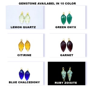 May include: Ten different gemstone pendants in various colours, including lemon quartz, green onyx, citrine, garnet, blue chalcedony, and ruby zoisite. Each pendant is a teardrop shape with a gold bail.