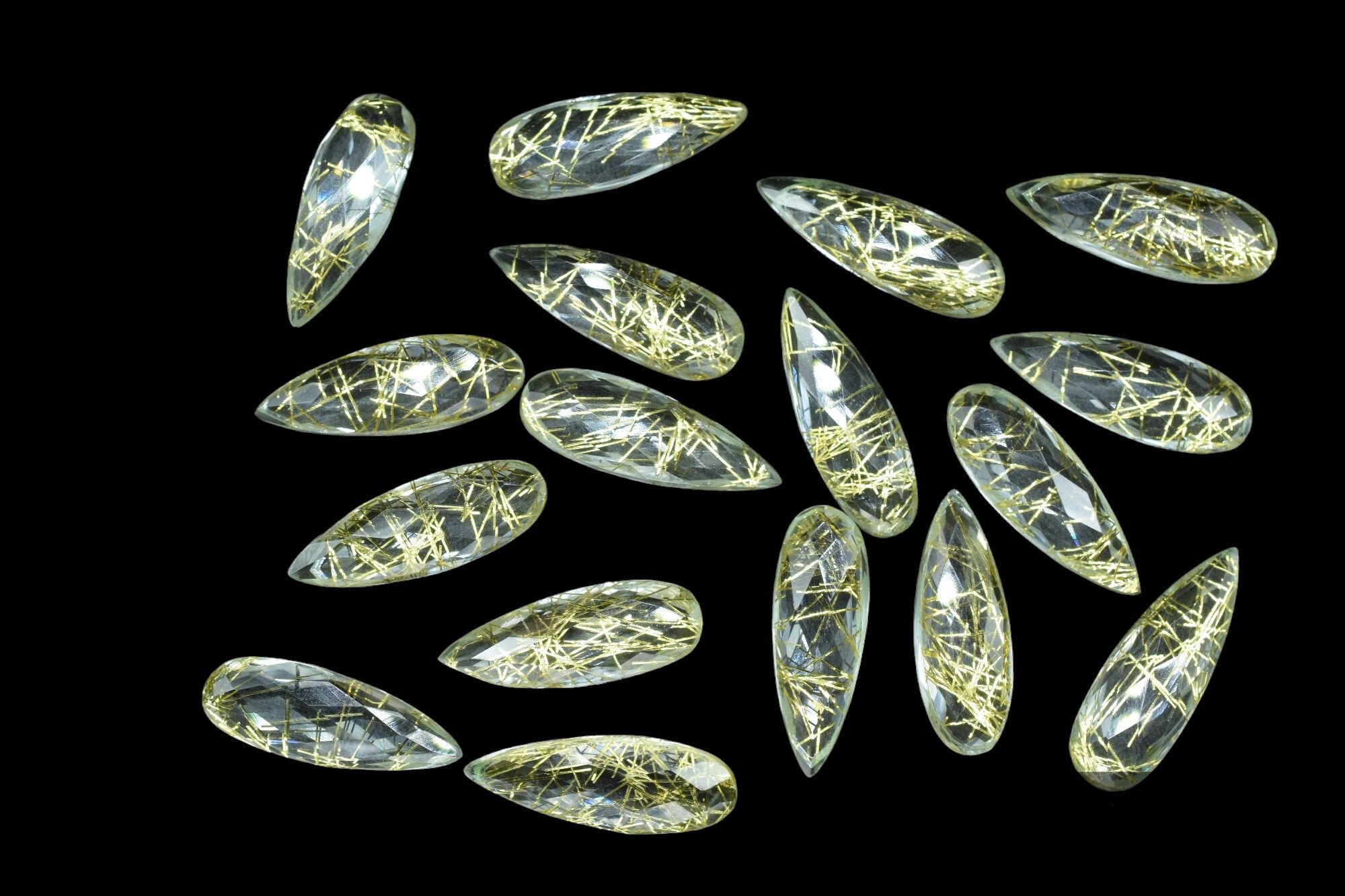 ゴールデンルチルクォーツファセット 10 x 30 mm ペアシェイプブリオ 