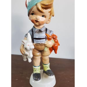 Vintage Little Boy Carrying Rabbit and Carrots Figurine 8.5&quot;