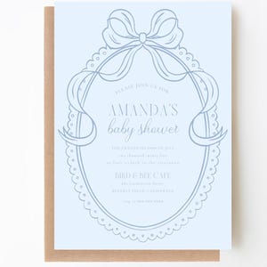 May include: A light blue baby shower invitation with a decorative frame and a bow. The text reads "Please join us for Amanda's baby shower, The twenty second of July, Two thousand twenty three, at five o'clock in the afternoon, Bird & Bee Cafe, 89 Sanderson Drive, Beverly Hills, California, RSVP to 555-555-5555."