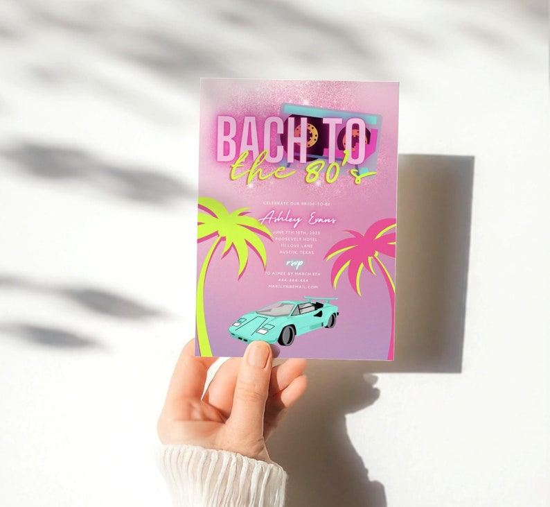 May include: A retro-themed invitation with the text "Bach to the 80's" in pink and yellow. The design includes a cassette tape, palm trees, and a teal sports car. The invitation is held by a person.