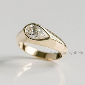 14k Gold Pear Moissanite Signet Ring: Champagne Diamond Accent