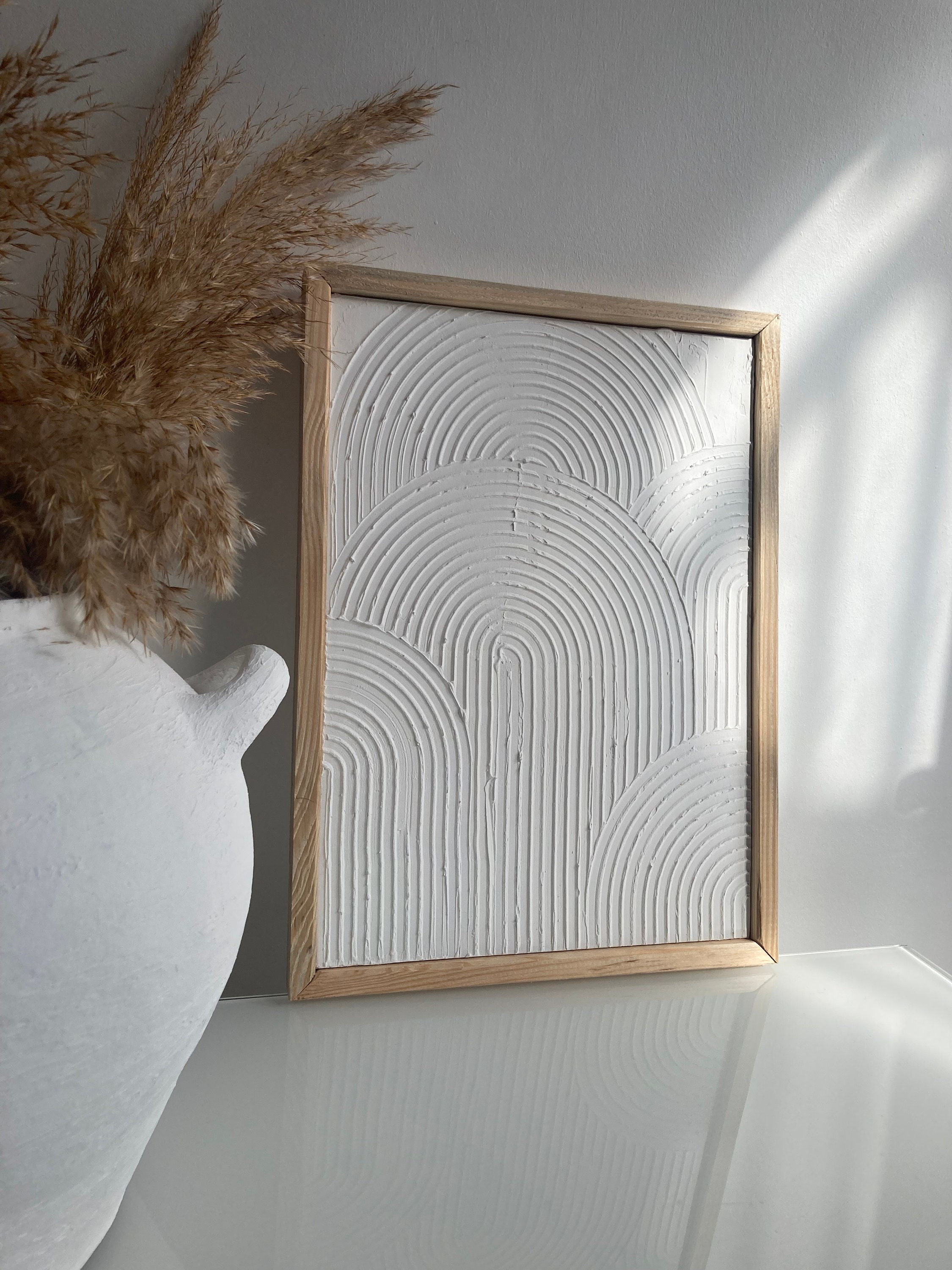 Plaster wall art deals