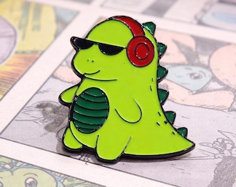 Cool Dinosaur Enamel Pin – DJ Dino Pin – Kawaii Music Dinosaur – Cute Green Dino Pin – Headphones Backpack Hat Jacket Pin