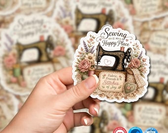 May include: A die-cut sticker featuring a vintage sewing machine surrounded by floral illustrations, lace, and spools of thread. The text reads Sewing is my Happy Place and Fabric, Friends & Stitches of Joy in a decorative script font.