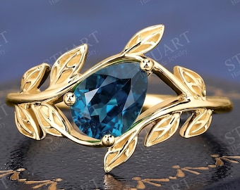 London Blue Topaz ring 18K yellow gold Nature inspired ring Pear cut Natural solitaire engagement ring handmade leaf ring for women