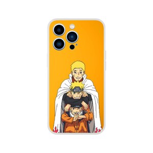 May include: A set of three ceramic mugs with a speckled, cream-colored glaze. Each mug features a different hand-painted design: a blue and green leaf, a yellow sun, and a pink flower. The mugs have a simple, modern design.