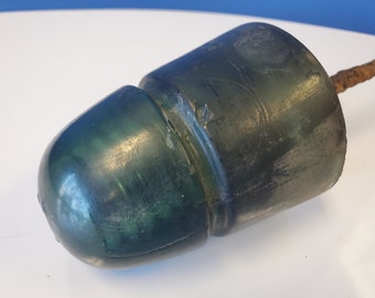 16 vintage glass dark green insulator with metal pole still attached,  Insulator Marked 16 on top-both the 6 and the 1 are backwards
