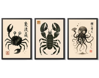 May include: Set of three framed art prints featuring black ink illustrations of sea creatures. Includes a crab, lobster, and octopus, each with Japanese text and a red seal on a cream background, all in black frames.